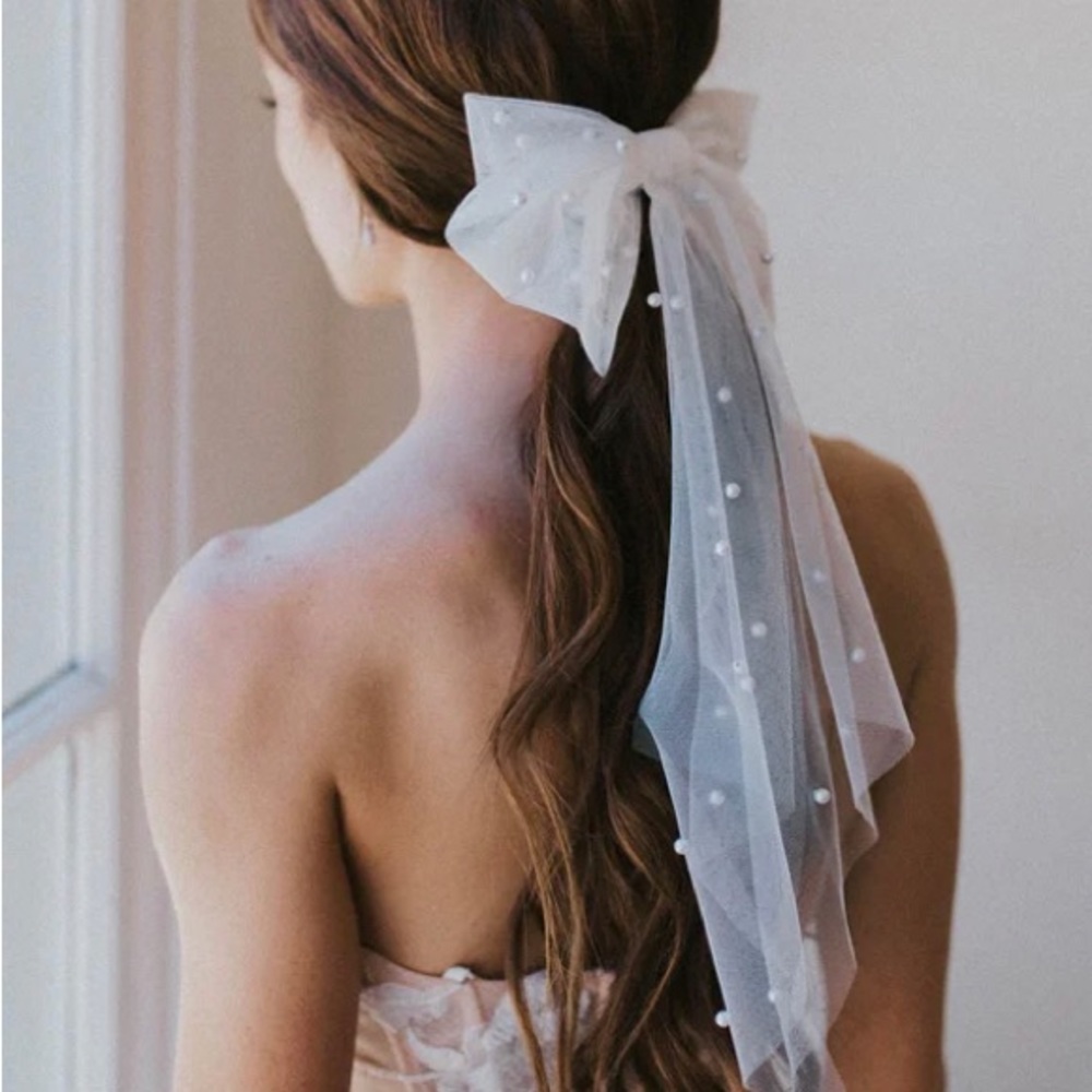Beautiful Bridal Bow with pearls and rhinestones.